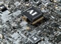 Close-up of a computer chip labeled AI on a circuit board, representing artificial intelligence agents